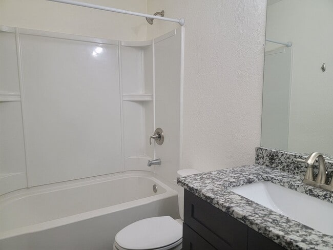 Building Photo - Rent a Community..Prime Location - Granite/LVT/SS Appliances