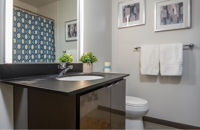 Building Photo - Rare Availability in the Streetcar Lofts, Parking, and Some Utilities Included