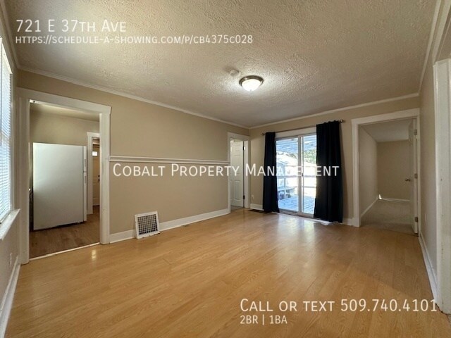 Building Photo - 721 E 37th Ave