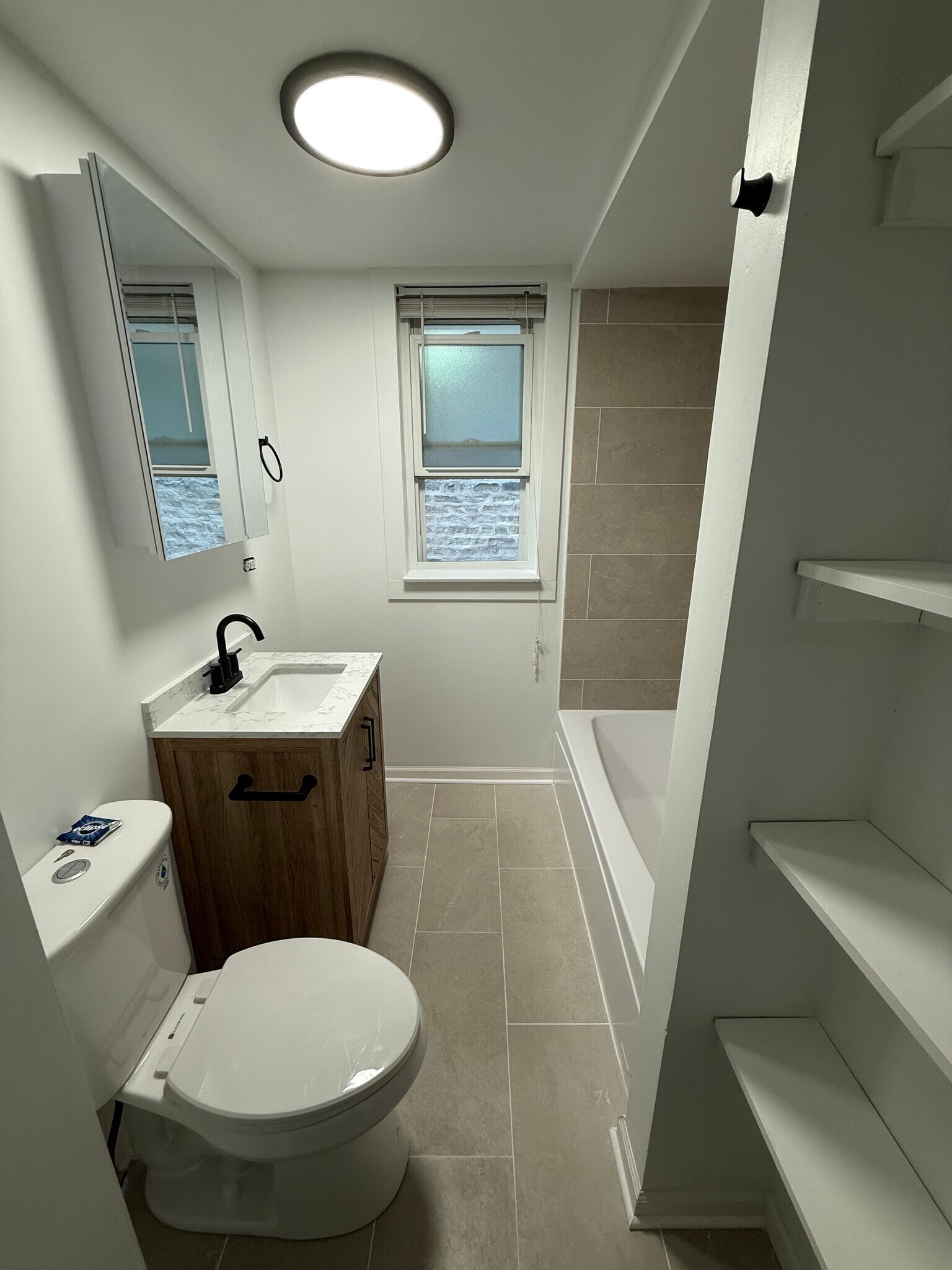 UPDATED bathroom - 3350 W Cuyler Ave