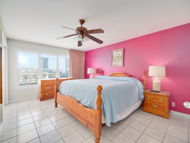 Master bedroom with north view of island and Sapphire condos - 130 Padre Blvd