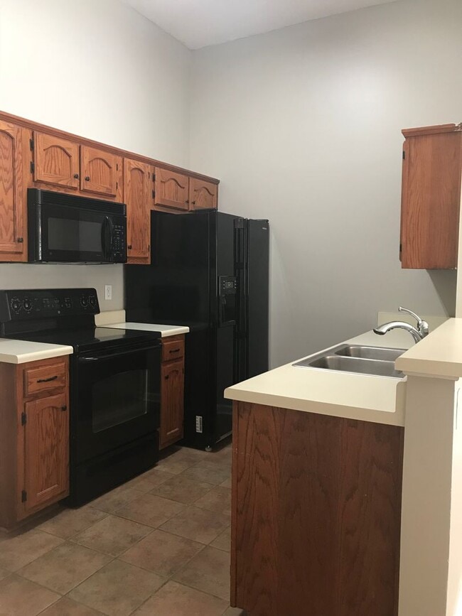 Building Photo - Olive Branch - 3 Bedroom, 2 Full bath Split Plan with Patio and Wood Privacy Fenced in Yard - Ove...