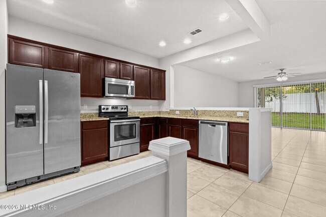 Building Photo - 6791 Roundleaf Dr