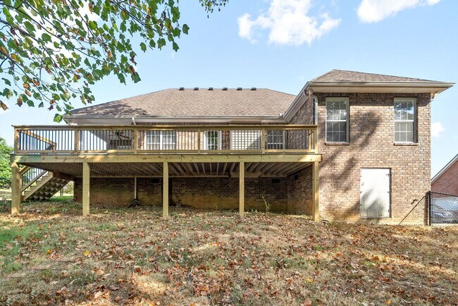 Building Photo - Pet Friendly Three Bedroom with Bonus!