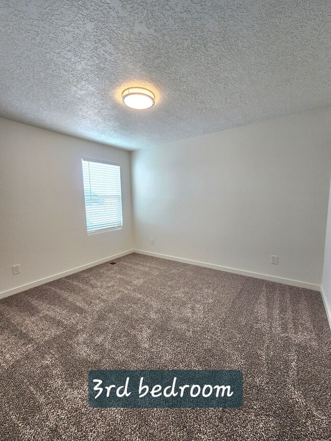 Building Photo - Brand-New Construction Townhome – Never Li...