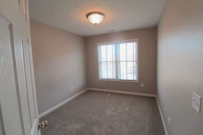 Building Photo - Upscale townhome  with attached garage for rent in the Townes at Bluestone!