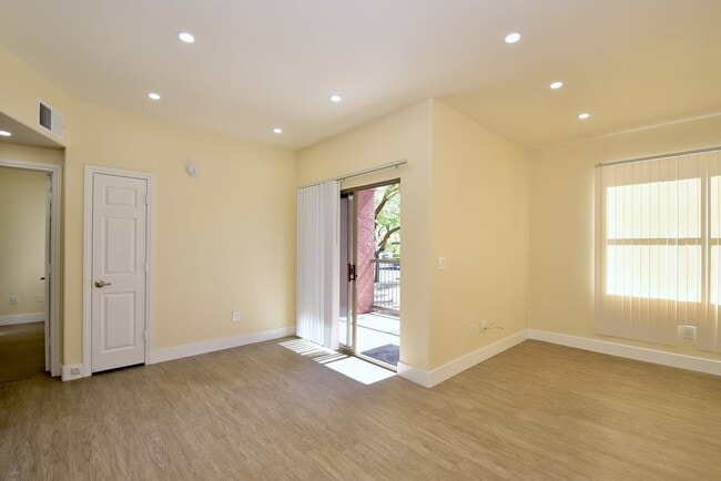 Building Photo - Charming Two-Bedroom Condo with Prime Location At Coronado Palms!