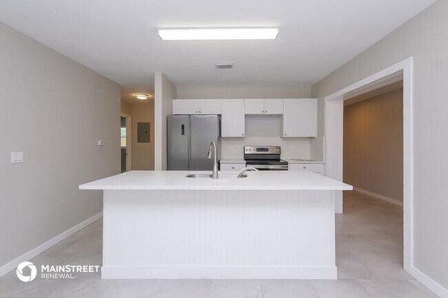 Building Photo - 1008 E Linebaugh Ave.