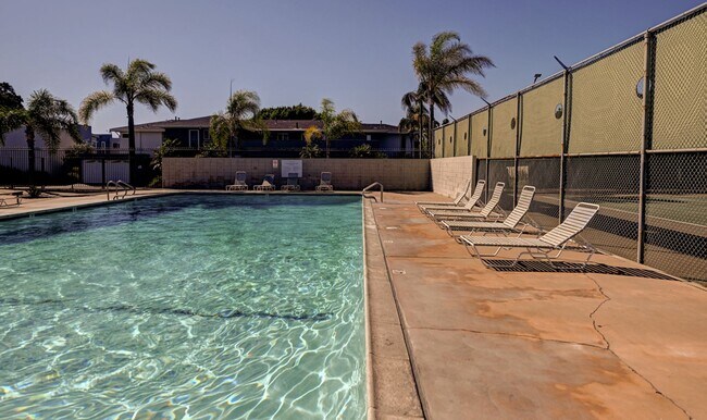 Building Photo - Updated, 3 bedroom 2.5 bath townhouse located in the Newport Riviera Community