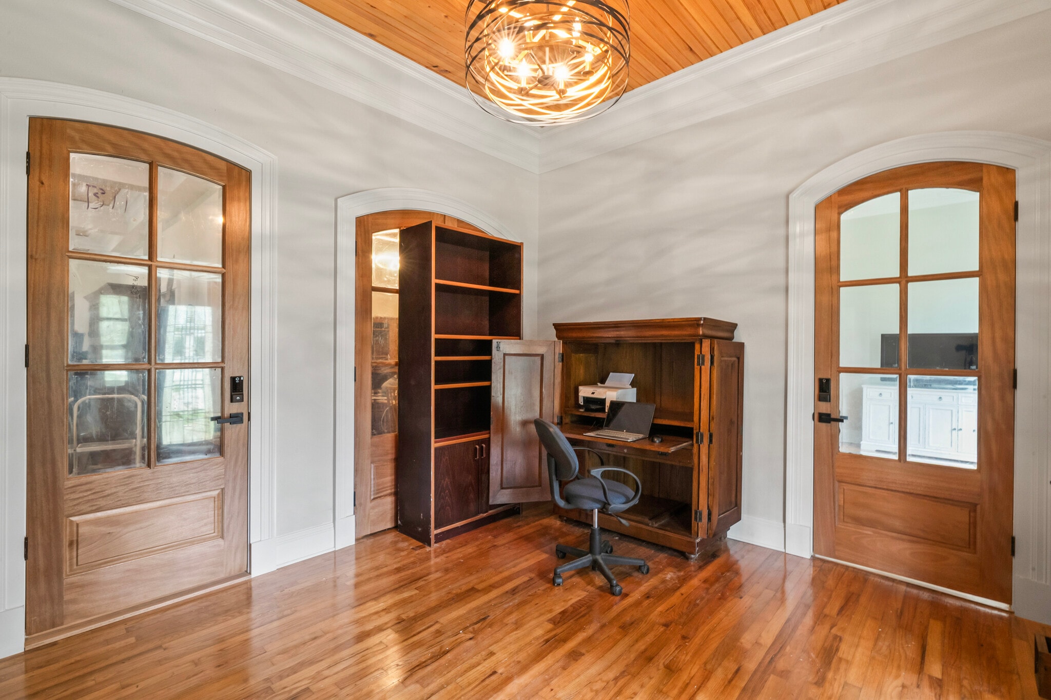 Entry foyer showing locked door to apartment. Foyer shared workspace including printer/scanner - 305 E 14th Ave