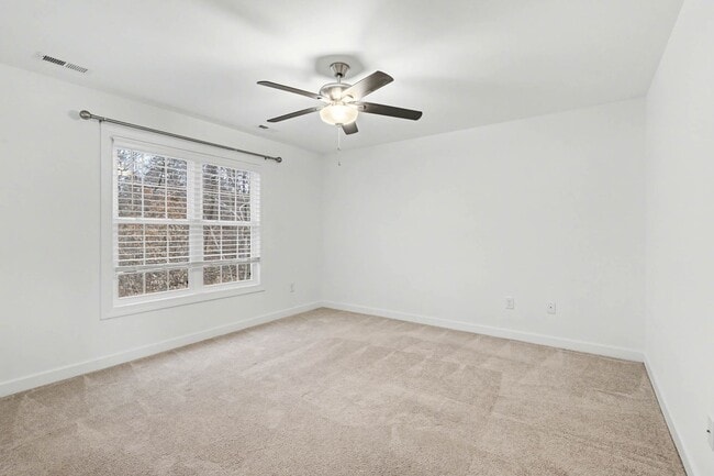 Building Photo - 4-bedroom, 2.5 bath with wooded view!