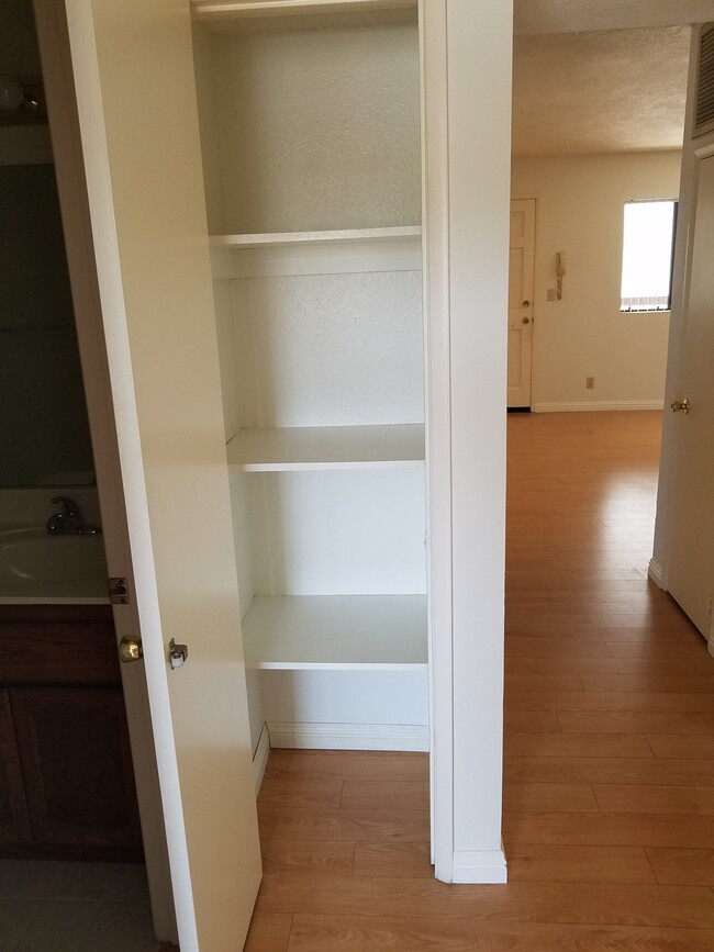 2 Bedroom 2 Bath Linen Closet in Hallway facing entry to West Bedroom - 520 Fischer St