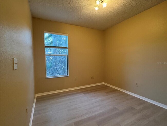 Building Photo - 8210 Whistling Pine Way