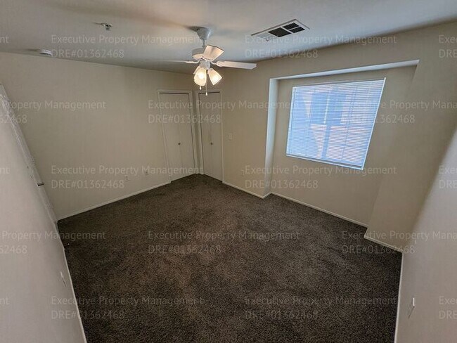 Building Photo - 2 bedroom 1.5 bathroom townhome located in a gated community near Hosking Ave/ S. Union Ave