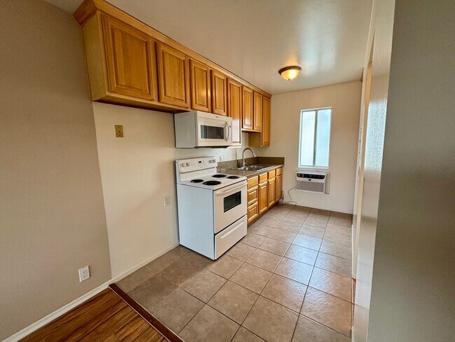 Building Photo - Bright and airy second floor studio, 1 bathroom apartment