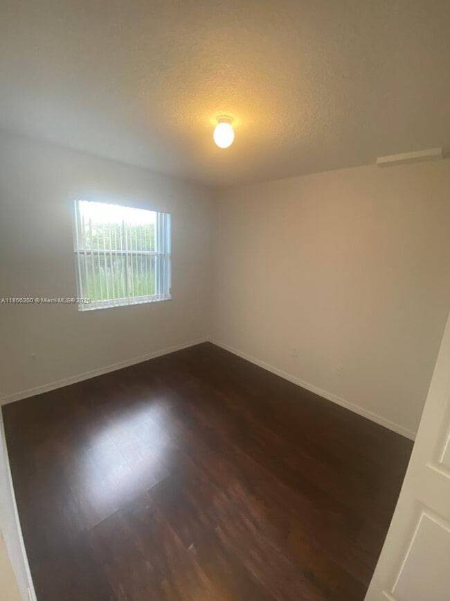 Building Photo - 6380 NW 114th Ave