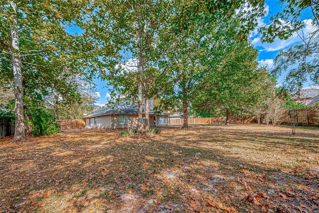 Building Photo - 7135 Woodland Oaks