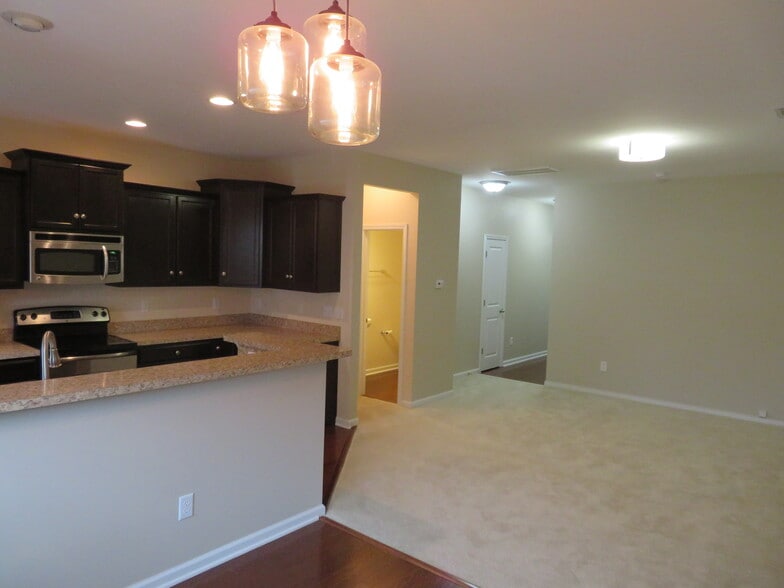 Dining, Kitchen, Half Bath, Great Room, Under Stair Storage, Great Room - 2496 Stadium Dr