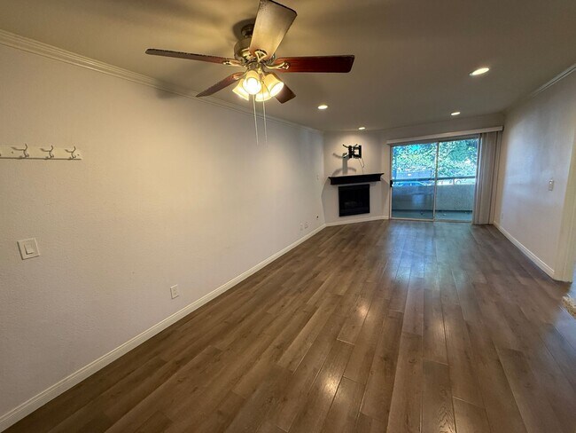 Building Photo - Modern 1-Bedroom Condo with Resort-Style A...