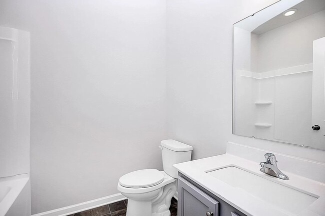 Building Photo - Home with 4 bedrooms, 3 full baths Fence in Yard