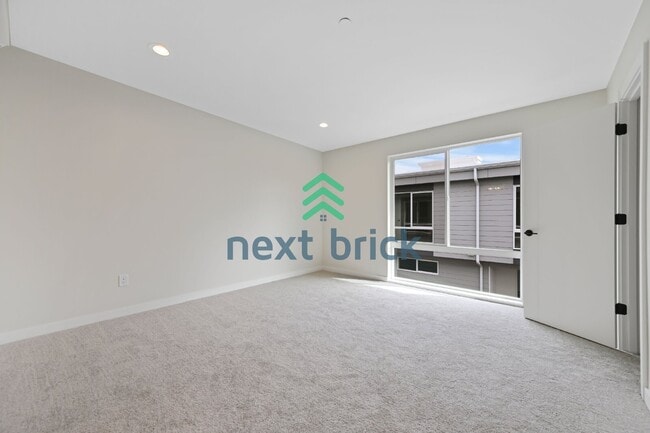 Building Photo - Brand-New 2026 Townhome | 3 Bed | 2.5 Bath | 1,560 Sq Ft | EV Garage | A/C Included