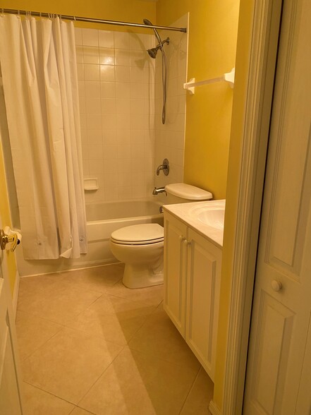 Primary bathroom with linen closet! - 9420 Ivy Brook Run