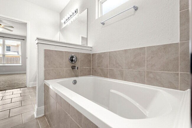 Building Photo - Pools, Waterslides, Fitness Center, Fishing, Splash Pad and MORE!