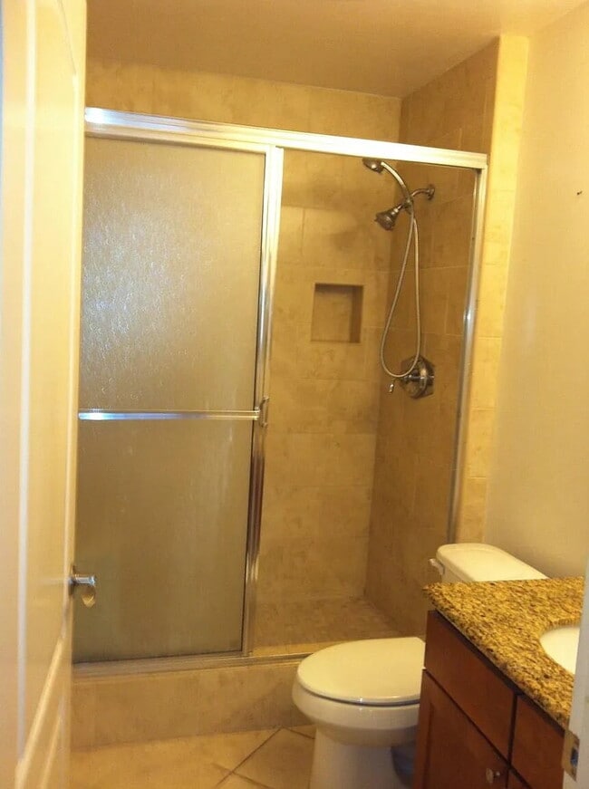 Building Photo - "Charming 2-Bed, 2-Bath Condo Retreat in San Marcos Oasis!"