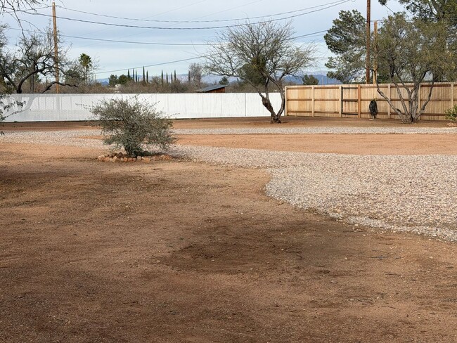 Building Photo - Fully Fenced Gorgeous Acre Property