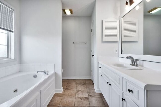 Building Photo - RENT SPECIAL! Freshly Painted! New Luxury ...