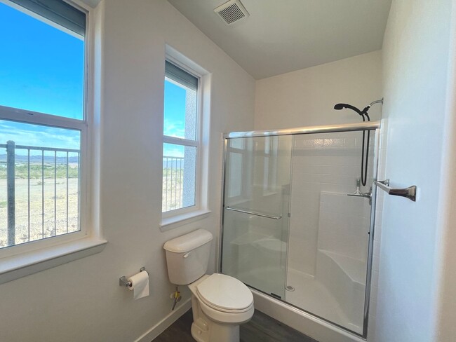Building Photo - Single-story 1326 sq ft, townhome built in 2019 w/3 bed, 2 bath & spacious attached 2-car garage ...