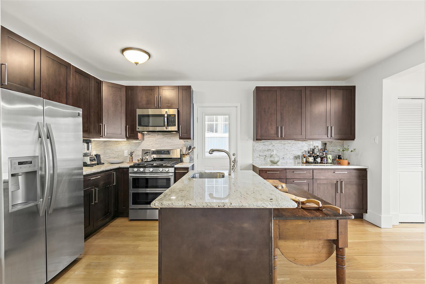 Slab granite counters and island - 306 3rd St