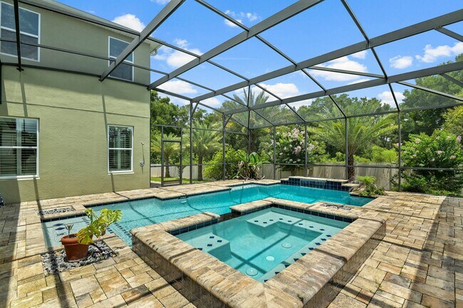 Building Photo - Expansive 4 bedroom, 3 bath remodeled home in gated community