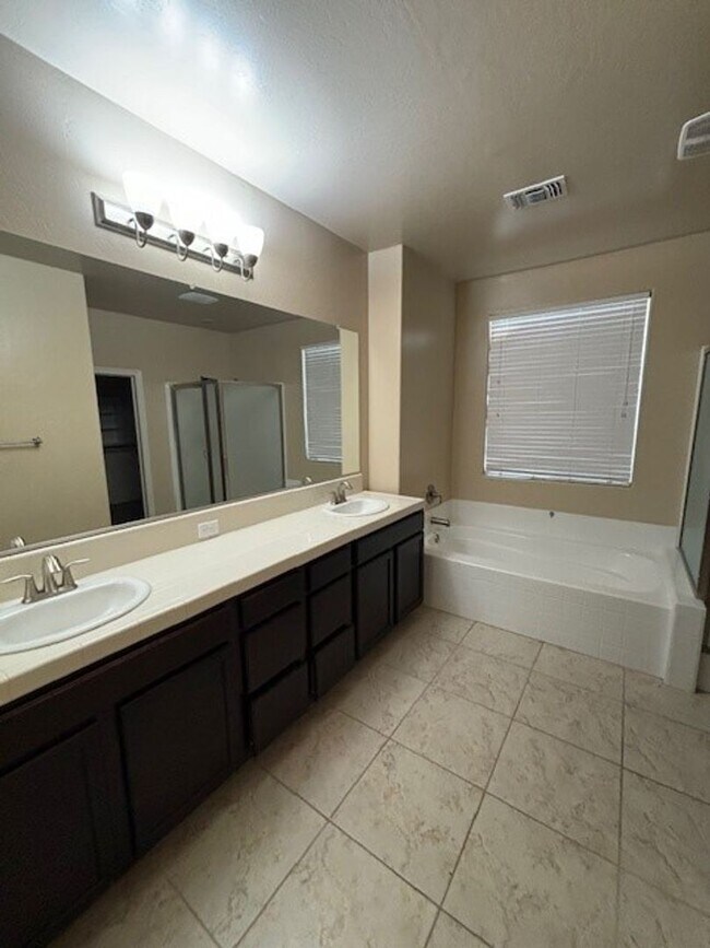 Building Photo - Elegant 4-Bedroom Home with Paid Solar in Gated Village Green Community