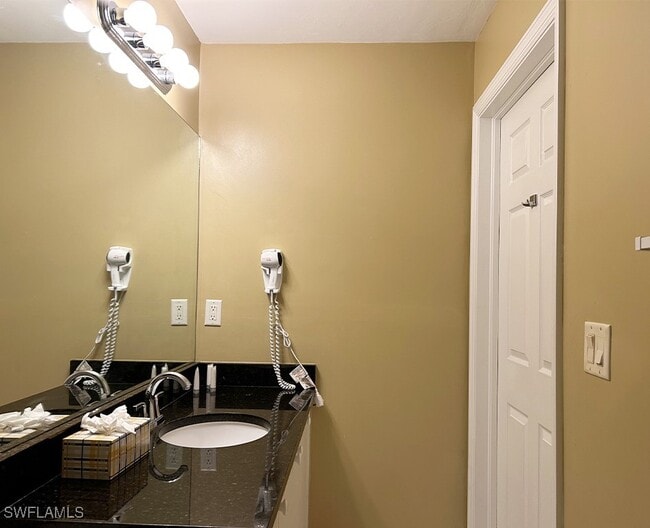 Building Photo - 25000 Tamiami Trl E