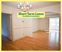 Building Photo - Beautiful condo with sunroom and hardwood floors - Short term lease only!