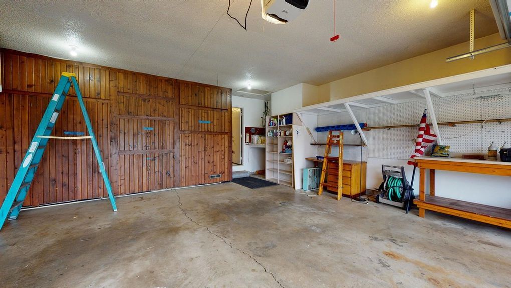 Garage wit shelving and storage cabinets - 306 S Washington St