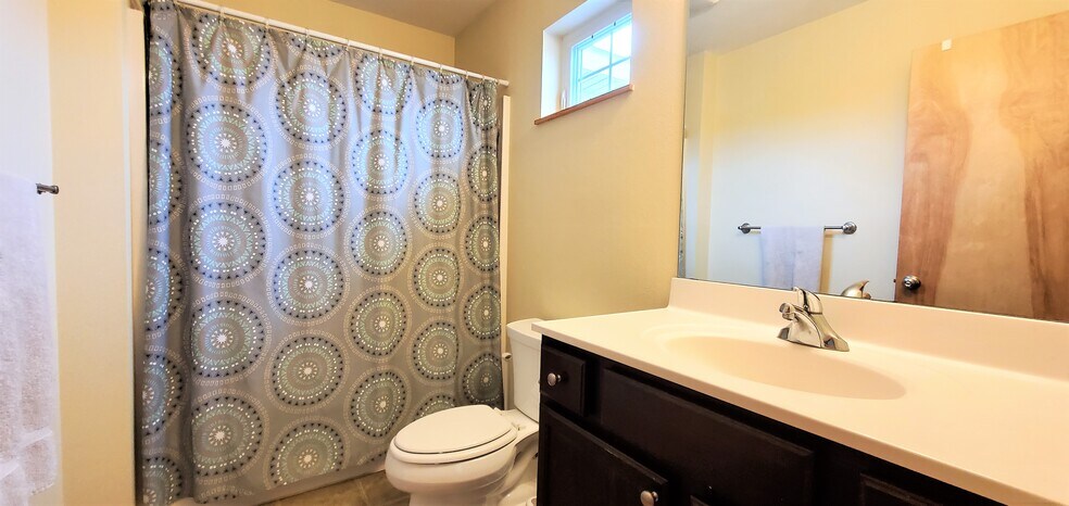 Bathroom upper level. (photo from neighboring unit with the same layout) - 1756 St Joseph St