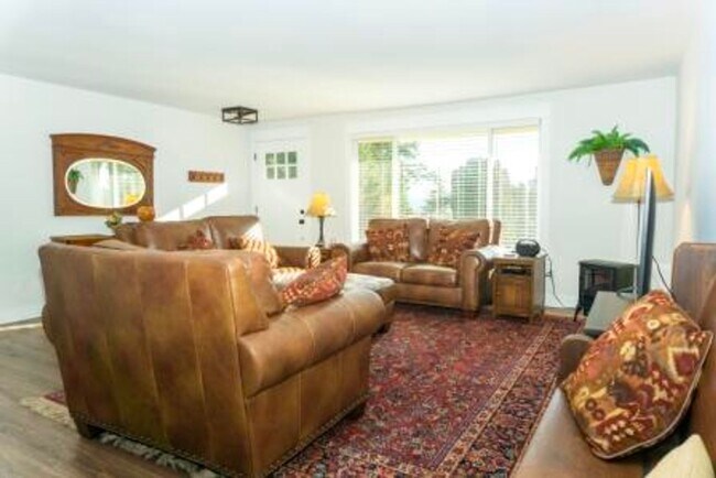 Building Photo - 3 bedroom, 2 bath with double car attached garage, newly remodeled.