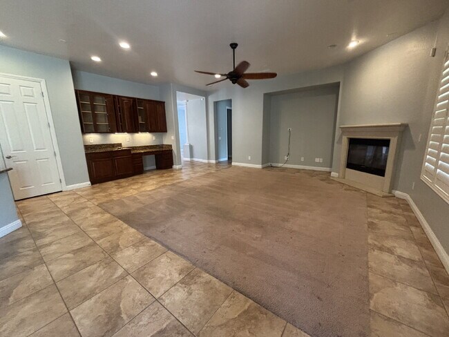 Building Photo - 5-Bed Retreat with Granite Elegance & Cozy Fireplace – 3690 Sq Ft of Comfort in Las Vegas with a ...