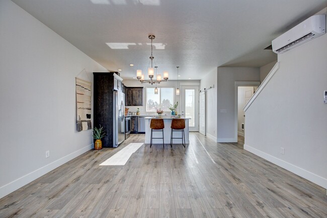 Building Photo - SOLAR POWERED TRI-LEVEL TOWNHOME BLENDS MO...