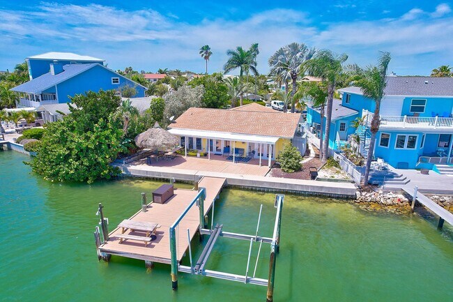 Building Photo - Waterfront 3BR/2BA Home – Walk to Beach + Boat Lift – $500 Off!