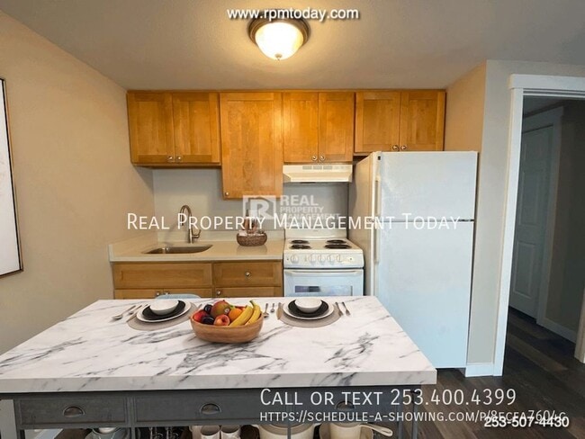 Building Photo - 6415 Steilacoom Blvd SW