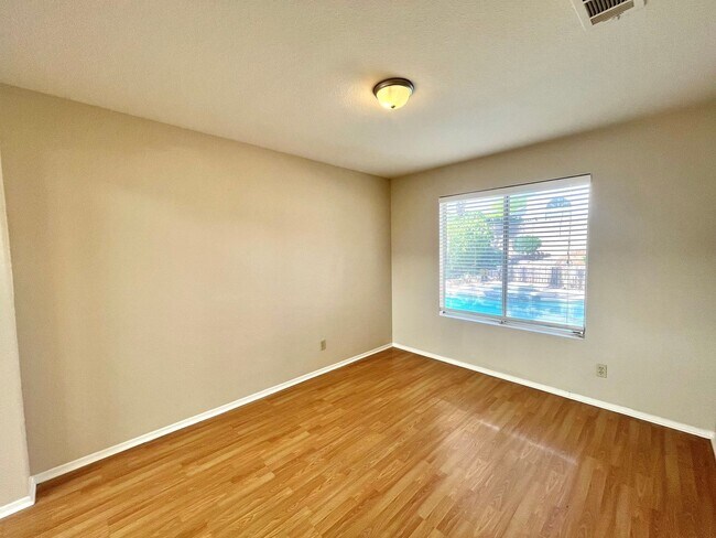 Building Photo - Gorgeous 4 Bedroom Home with Pool & Spa Located in The Lakes