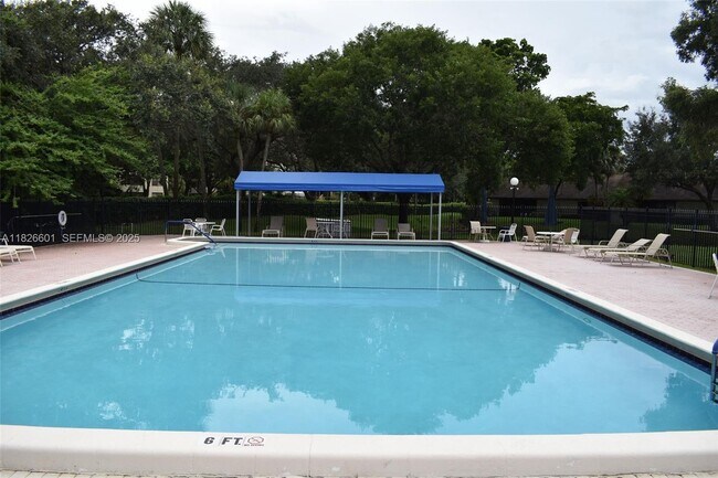 Building Photo - 4459 Carambola Cir S