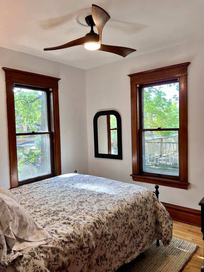 The back bedroom with new queen bed. - 2424 Stevens Ave