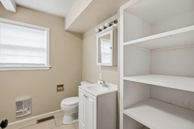 Building Photo - Expansive Living at an Unbeatable Value: Your Ultimate Multi-Level Escape!