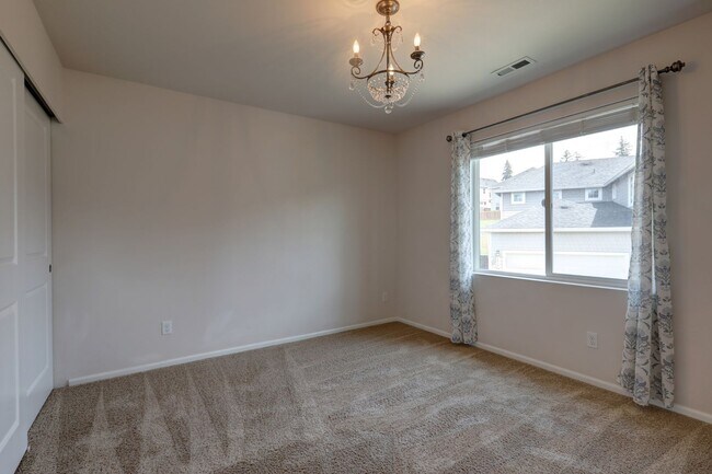Building Photo - 4 Bedroom Home with Open Den, Living & Family Rooms – Space for Everyone