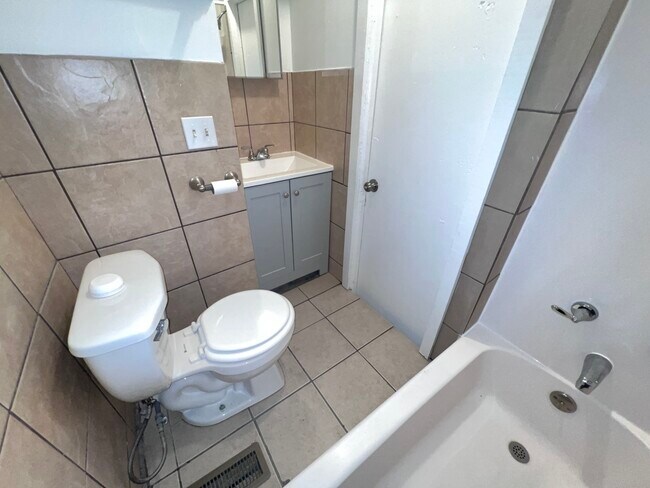 Building Photo - 8919 S Muskegon Ave