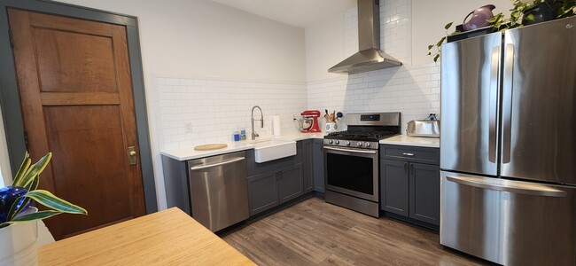 Professionally remodeled kitchen with all new appliances! - 1023 28th Ave NE